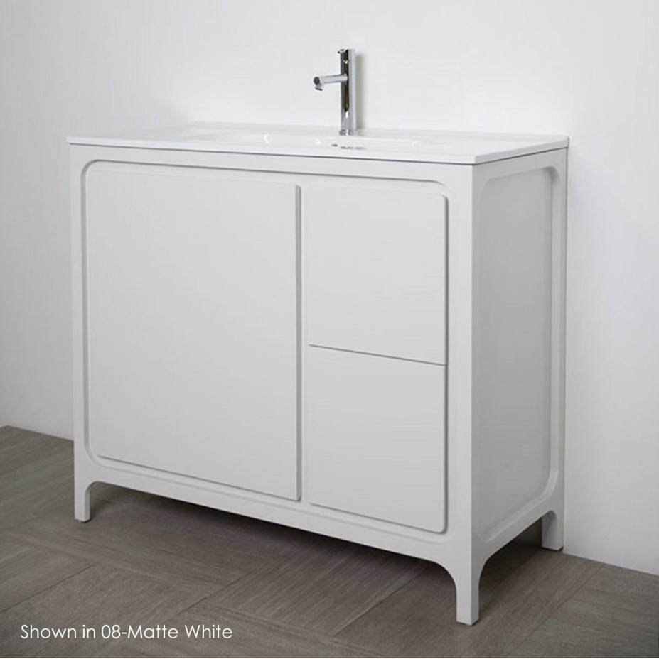 Lacava Free standing under counter vanity with routed finger pulls on two drawers and one door.